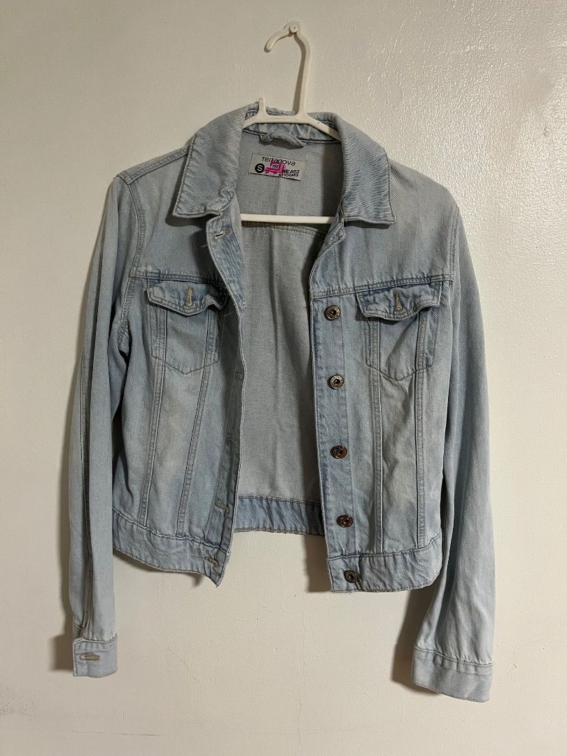 Terranova Light Wash Denim Jacket (Category: Coats, Jackets and Outerwear) located in Cabuyao City. Submitted by rdtrmt (Listing ID 1469866703, Image 1). Description: - Brand: Terranova - Style: Classic trucker denim jacket - Color: Light wash blue - Size: Small - Details: Button-up front, metallic hardware, dual chest flap pockets, structured collar.