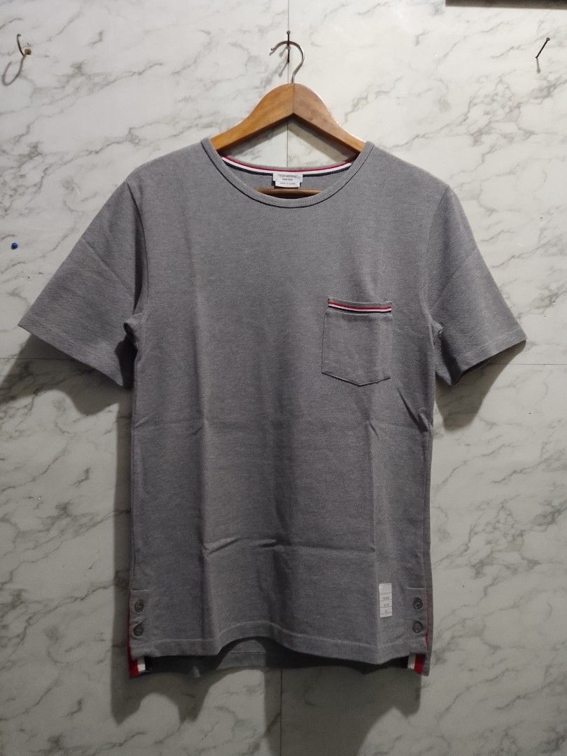 Thom Browne Pocket T-shirt (Category: Tshirts & Polo Shirts ) located in Paranaque City. Submitted by lanceee.999 (Listing ID 1469850077, Image 1). Description: Size: 1 (Small) Complete Tags Off/Authentic No Issue Excellent Condition.