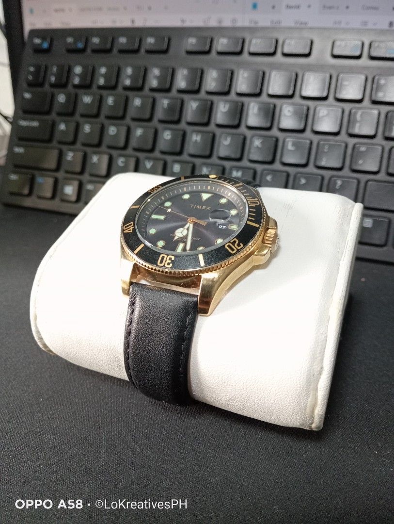 Timex Harborside Coast (With Issue) (Category: Men's Watches) located in Cavite. Submitted by purpose_served (Listing ID 1469779940, Image 1). Description: Timex Harborside Coast Quartz Black Dial Men's Watch Issue: The date does not advance automatically as the time progresses. However, the date can still be manually adjusted and changed correctly when adjusted. Gold-tone low lead brass case with a black leather strap. Rotating black low lead br