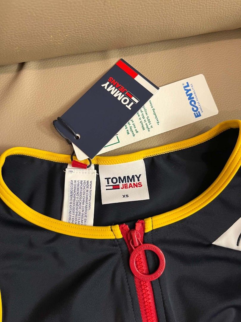 Tommy Front Zip swim top (Category: Babies & Kids Fashion) located in Lucena. Submitted by fiercemoon-a25a79 (Listing ID 1469796794, Image 2). Description: .