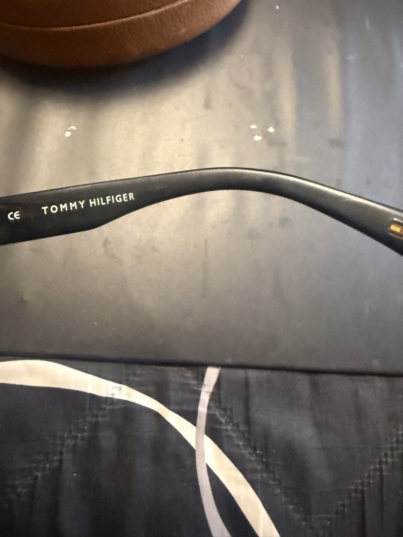 Tommy hilfiger (Category: Sunglasses & Eyewear) located in Quezon City. Submitted by d8bhk9y4rs (Listing ID 1469759289, Image 3). Description: - Brand Tommy Hilfiger - Color: Classic Black - Protection: Sturdy hard shell design - Interior: Subtle brand print lining - Inclusions: Original white info card - Condition: Clean and ready for use.