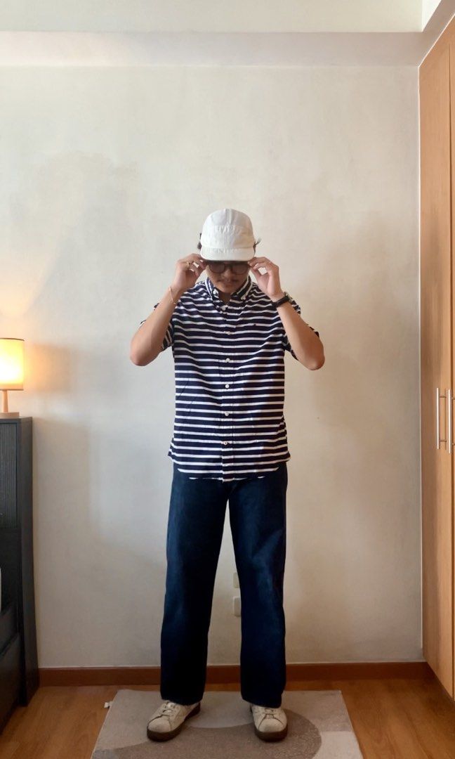 Tommy Hilfiger - Striped Polo (Category: Tshirts & Polo Shirts ) located in Manila. Submitted by foundgoods00 (Listing ID 1469898676, Image 2). Description: Sporty tito vibes. My height is 5’8 Good condition. No issue..