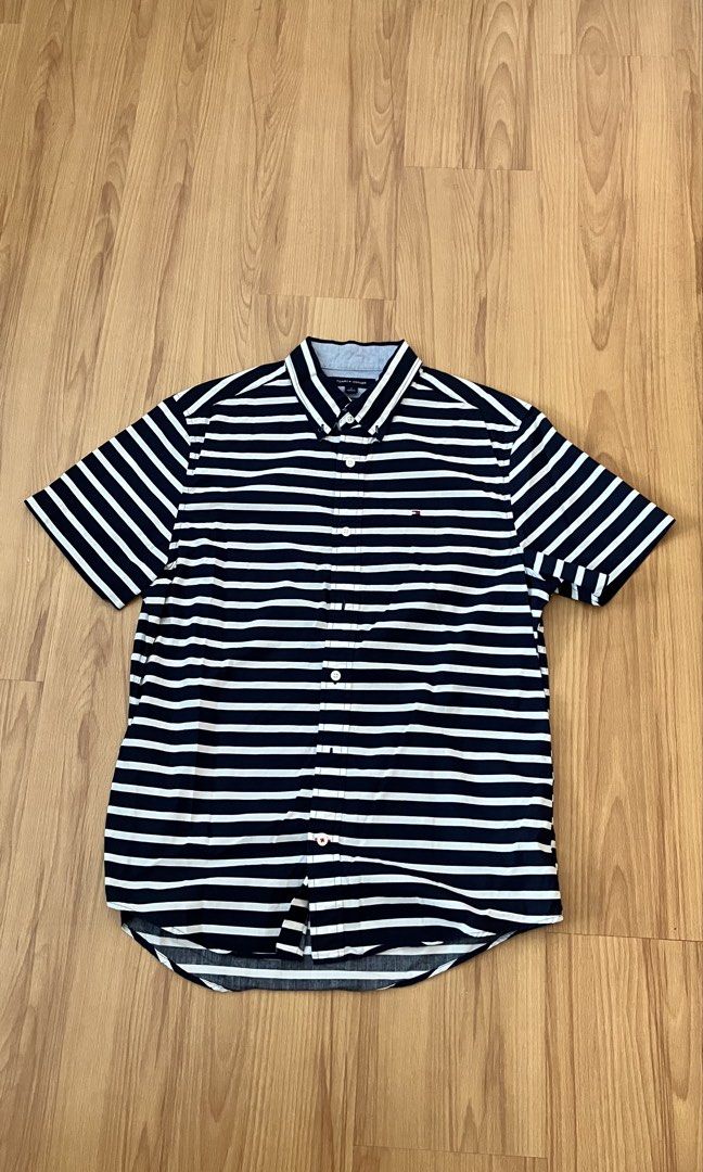 Tommy Hilfiger - Striped Polo (Category: Tshirts & Polo Shirts ) located in Manila. Submitted by foundgoods00 (Listing ID 1469898676, Image 1). Description: Sporty tito vibes. My height is 5’8 Good condition. No issue..