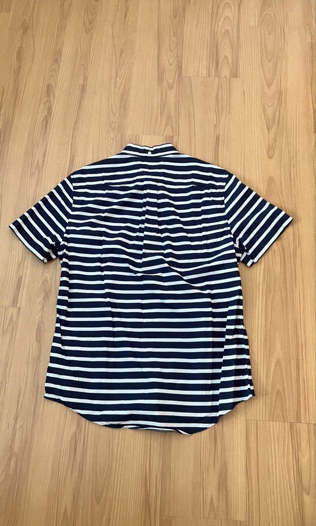 Tommy Hilfiger - Striped Polo (Category: Tshirts & Polo Shirts ) located in Manila. Submitted by foundgoods00 (Listing ID 1469898676, Image 3). Description: Sporty tito vibes. My height is 5’8 Good condition. No issue..