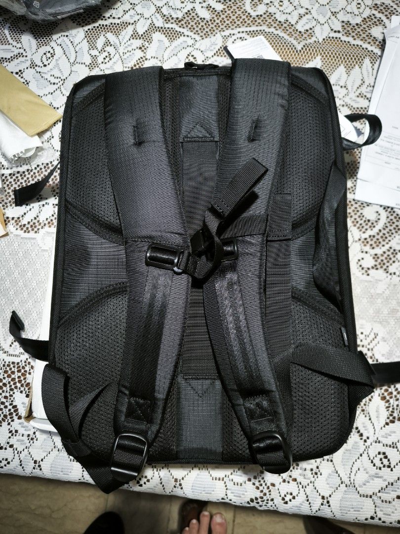 Tomtoc T66 28L Travel Backpack (Category: Backpacks) located in Quezon City. Submitted by dei_12 (Listing ID 1469814718, Image 2). Description: - Brand: tomtoc (Recycled Collection) - Condition: Brand new with tags attached - Color: Black - Laptop Compartment: Dedicated sleeve with a security strap - Design: Main compartment zips open fully like a suitcase for easy packing - Comfort: Breathable mesh back panel and padded shoulder straps with ches