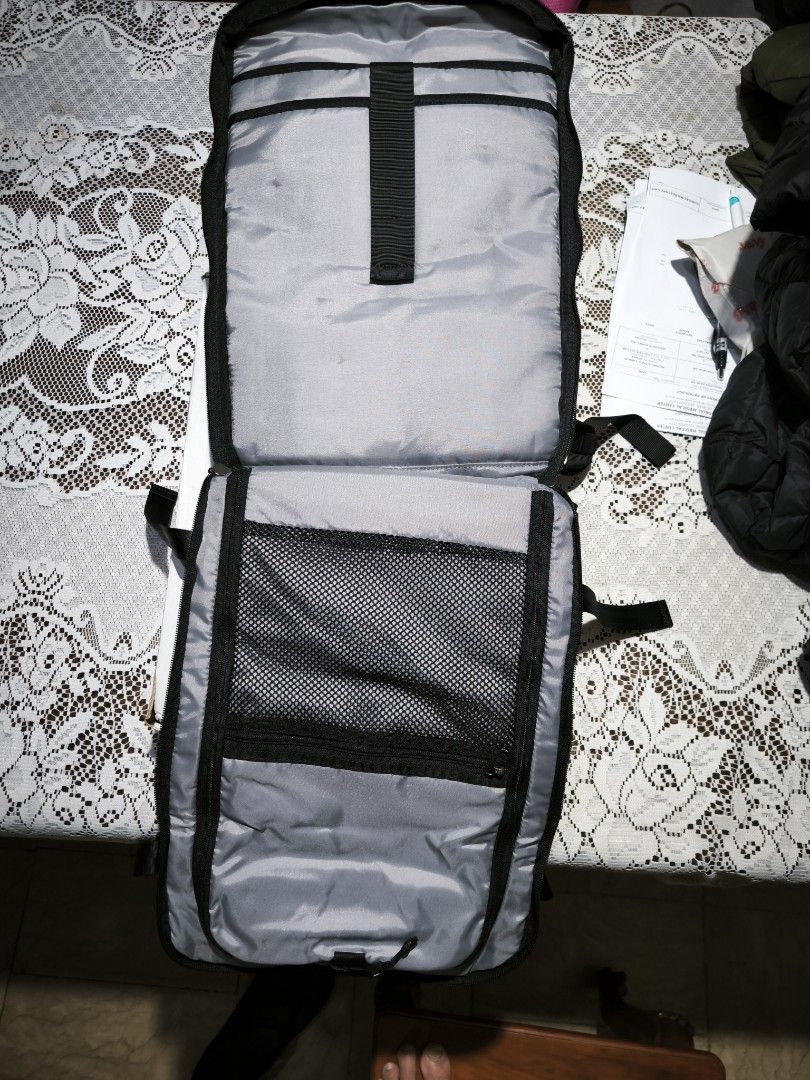 Tomtoc T66 28L Travel Backpack (Category: Backpacks) located in Quezon City. Submitted by dei_12 (Listing ID 1469814718, Image 3). Description: - Brand: tomtoc (Recycled Collection) - Condition: Brand new with tags attached - Color: Black - Laptop Compartment: Dedicated sleeve with a security strap - Design: Main compartment zips open fully like a suitcase for easy packing - Comfort: Breathable mesh back panel and padded shoulder straps with ches