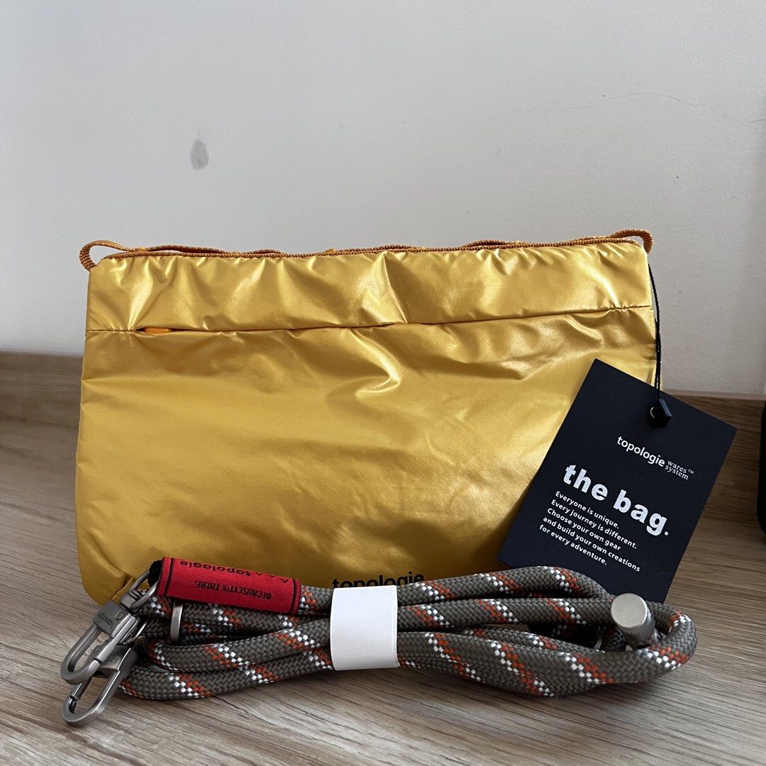 Topologie Bag (Metallic Yellow) (Category: Sling Bags) located in Manila. Submitted by mrnduque (Listing ID 1469836925, Image 2). Description: Not my type. Can fit an iPad mini. Shipping fees will be shouldered by the buyer..