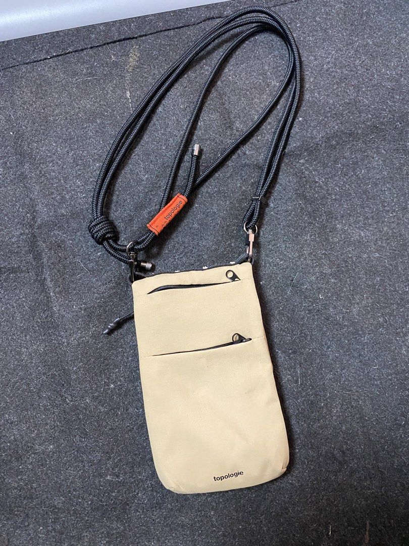 Topologie Sling Bags (Category: Sling Bags) located in Quezon City. Submitted by loloyz123 (Listing ID 1469914435, Image 1). Description: Topologie Sling Bags Condition: Very good Color rate: 10/10 Color: khaki Size: L: 7 W: 4.5 inches.