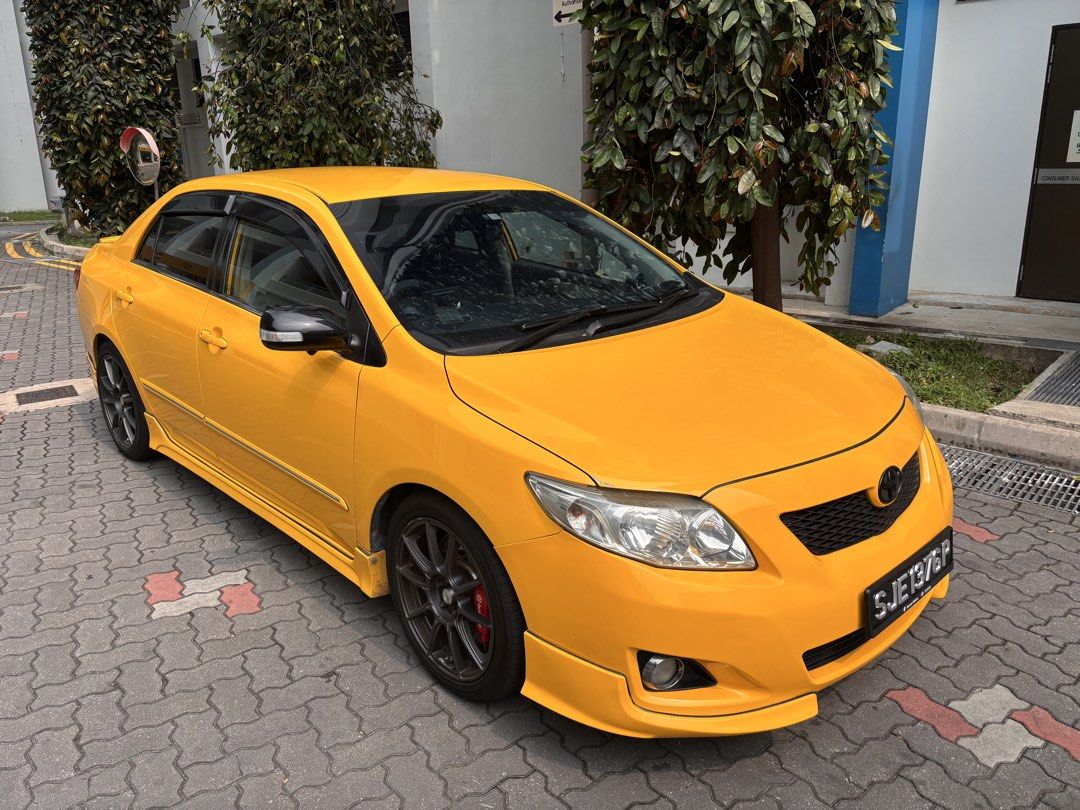 Toyota Corolla Altis 1.6 Classic (A) (Category: Used Cars) located in Singapore. Submitted by partusay (Listing ID 1469834409, Image 2). Description: Well condition interior and exterior considering it’s age. Everything is fully functional. Front 2 Brembo ceramic brake calipers. Aftermarket coilovers. Android infotainment system with 360 camera. Upgraded sound system with subwoofer. Keyless start stop installed. Throttle control. Interior ambient