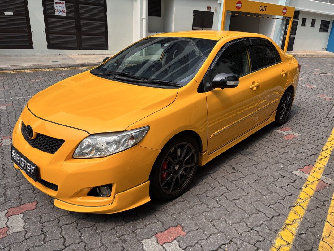 Toyota Corolla Altis 1.6 Classic (A) (Category: Used Cars) located in Singapore. Submitted by partusay (Listing ID 1469834409, Image 3). Description: Well condition interior and exterior considering it’s age. Everything is fully functional. Front 2 Brembo ceramic brake calipers. Aftermarket coilovers. Android infotainment system with 360 camera. Upgraded sound system with subwoofer. Keyless start stop installed. Throttle control. Interior ambient