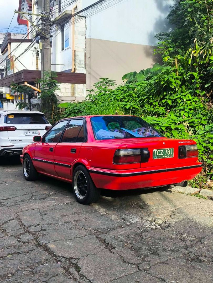 Toyota Corolla Small Body Manual (Category: Used Cars) located in Baguio. Submitted by joseph.kitma (Listing ID 1469879370, Image 3). Description: - 3rd Gen 4E-FTE 1.3 Turbo - HKS Blow-Off Valve & GReddy Turbo Gauge - Legit Carbon-Fiber Hood with Starlet Scoop - Lowering Springs & Strut Bar - Power Steering & Short Shift - Cold A/C - R15 Banana Mags & Achilles Tires - JDM Rear Bumper, Door Handles & Moldings - Sprinter Front Bumper - New Distribu