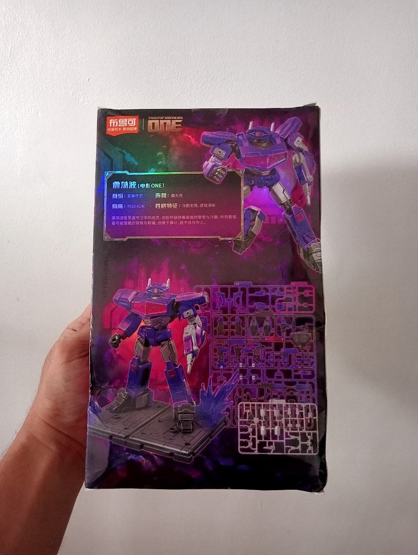 Transformers One Shockwave Classic Class (Category: Action & Battle Toys) located in Muntinlupa City. Submitted by mcnigel84 (Listing ID 1469855359, Image 2). Description: - Official licensed Transformers One Shockwave action figure model kit - Made by Yolepark (Classic Class Champion series) - Features striking purple character design - Comes complete with weapons and a display base - Unbuilt runner parts included inside the box - Slightly dent 