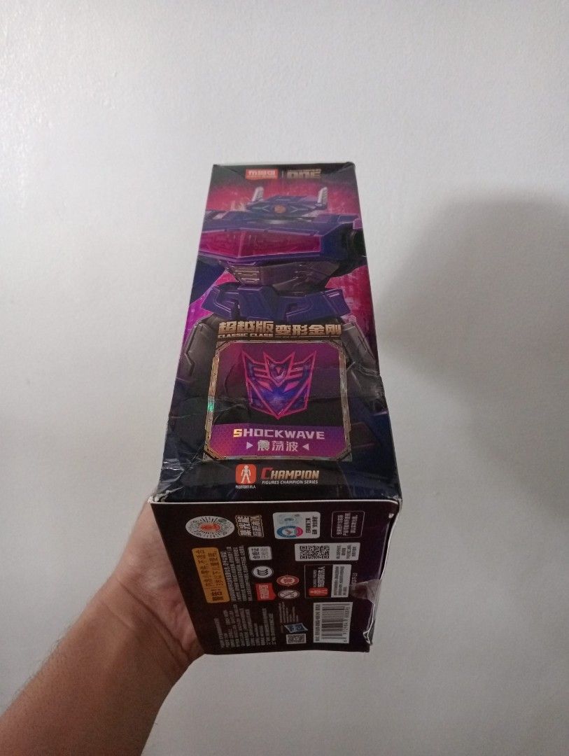 Transformers One Shockwave Classic Class (Category: Action & Battle Toys) located in Muntinlupa City. Submitted by mcnigel84 (Listing ID 1469855359, Image 3). Description: - Official licensed Transformers One Shockwave action figure model kit - Made by Yolepark (Classic Class Champion series) - Features striking purple character design - Comes complete with weapons and a display base - Unbuilt runner parts included inside the box - Slightly dent 