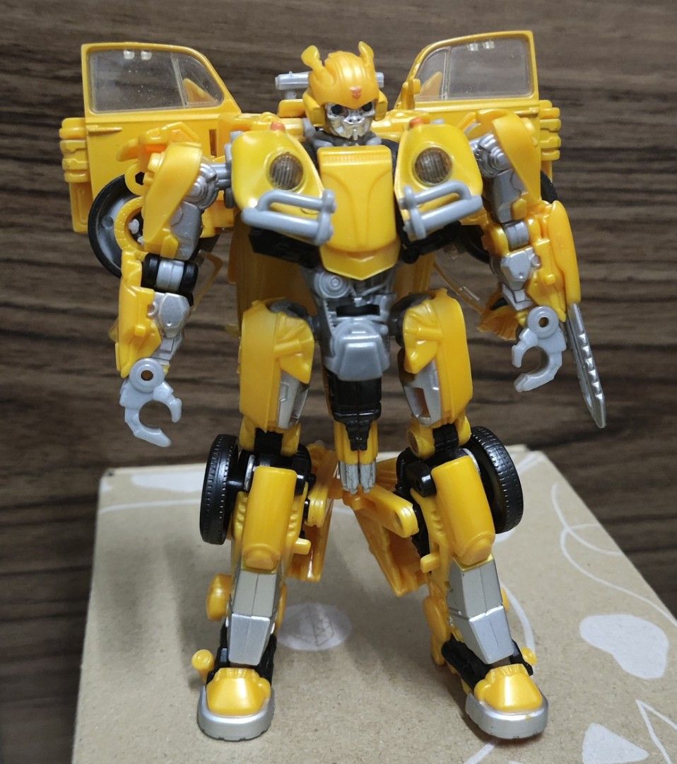 Transformers Studio Series Bumblebee (2018) Deluxe ClassVolkwagen Beetle Bumblebee (Category: Action & Battle Toys) located in Pasay City. Submitted by laurence.foz (Listing ID 1469852537, Image 1). Description: Condition: Loose, with manual, complete accessories MOP: BDO, BPI, GCash, Maribank Shipping: JnT, Lalamove, Grab, GogoXpress.