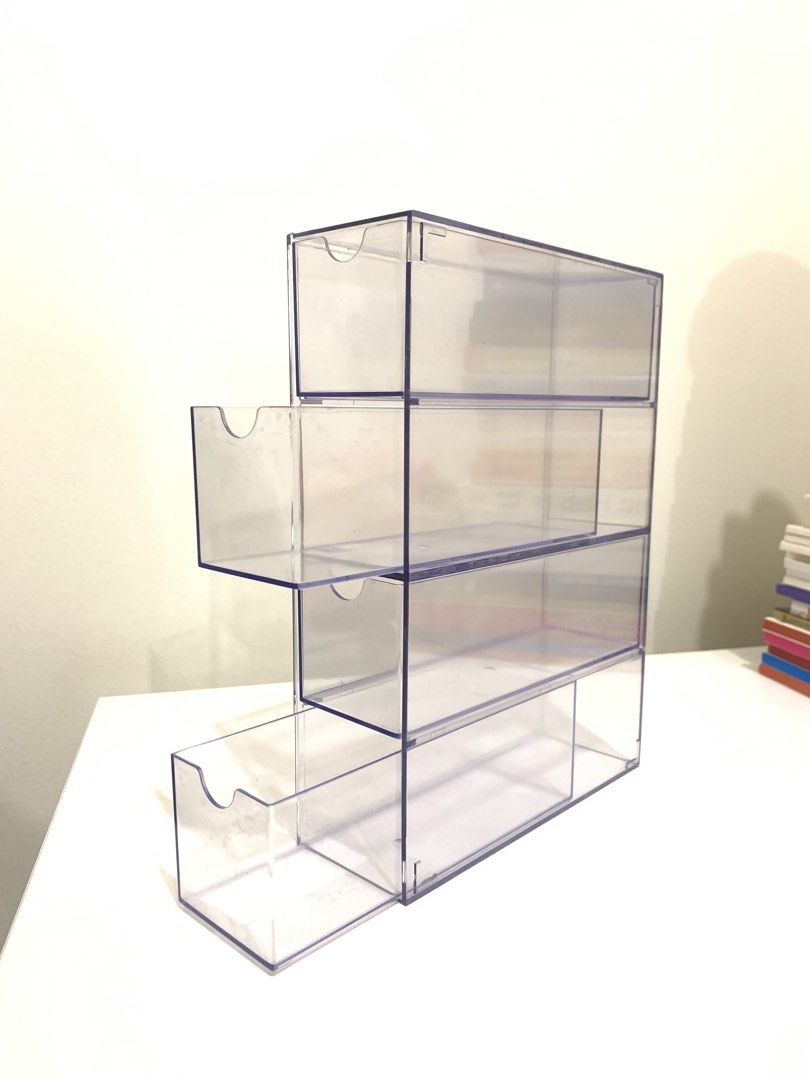 Transparent Acrylic 4-Layer Desk Drawer Organizer (Category: Storage Boxes & Baskets) located in Pasig City. Submitted by lovedbyri (Listing ID 1469836176, Image 1). Description: - Material: Sturdy clear acrylic - Features: 4 smooth sliding drawers - Versatile: Can be set up vertically or horizontally - Ideal for: Makeup, cosmetics, contact lenses, and small stationery - Design: Transparent for easy and quick item location.