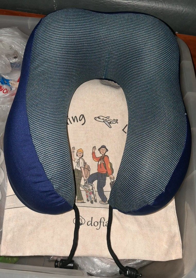 Travel Neck Pillow with Storage Bag (Category: Travel Essentials & Accessories) located in Mandaluyong City. Submitted by gantan.tree (Listing ID 1469866090, Image 1). Description: Travel Neck Pillow with Storage Bag Brand: Dofia Color/Material: Blue breathable mesh top w/ solid dark blue sides Fit: Adjustable black drawstring cords at the front for a snug, custom fit Inclusion: Matching cream canvas storage bag w/ cute travel graphics Best for: 