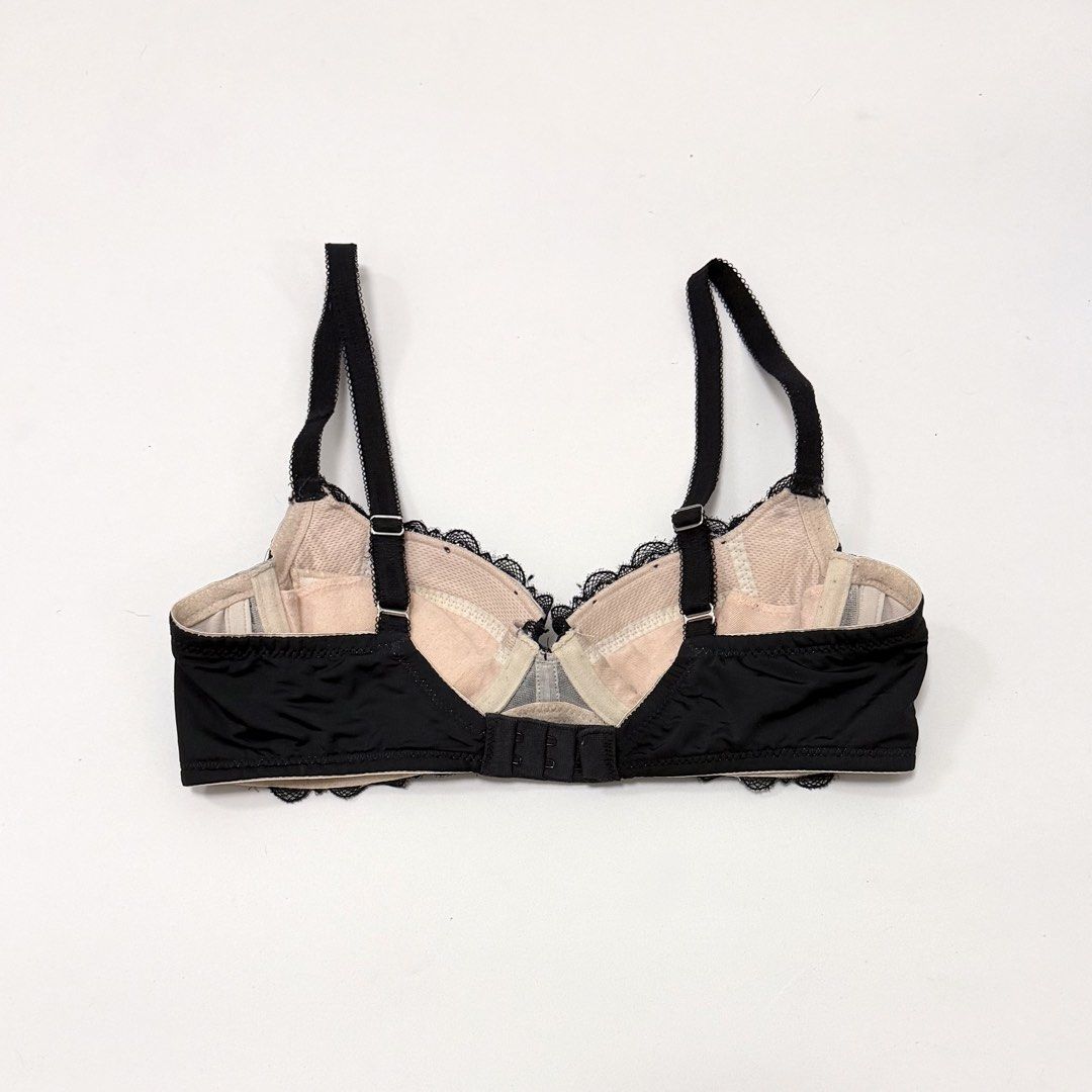 TRIUMPH Black Lace Balconette Bra [34B] (Category: Undergarments & Loungewear) located in Malabon City. Submitted by k_intimates (Listing ID 1469933281, Image 3). Description: Details: • Size 34B / wired / lightly lined • No issues • Black lace underwire balconette bra featuring a contrasting beige inner cup lining and scalloped lace trim along the top edges..
