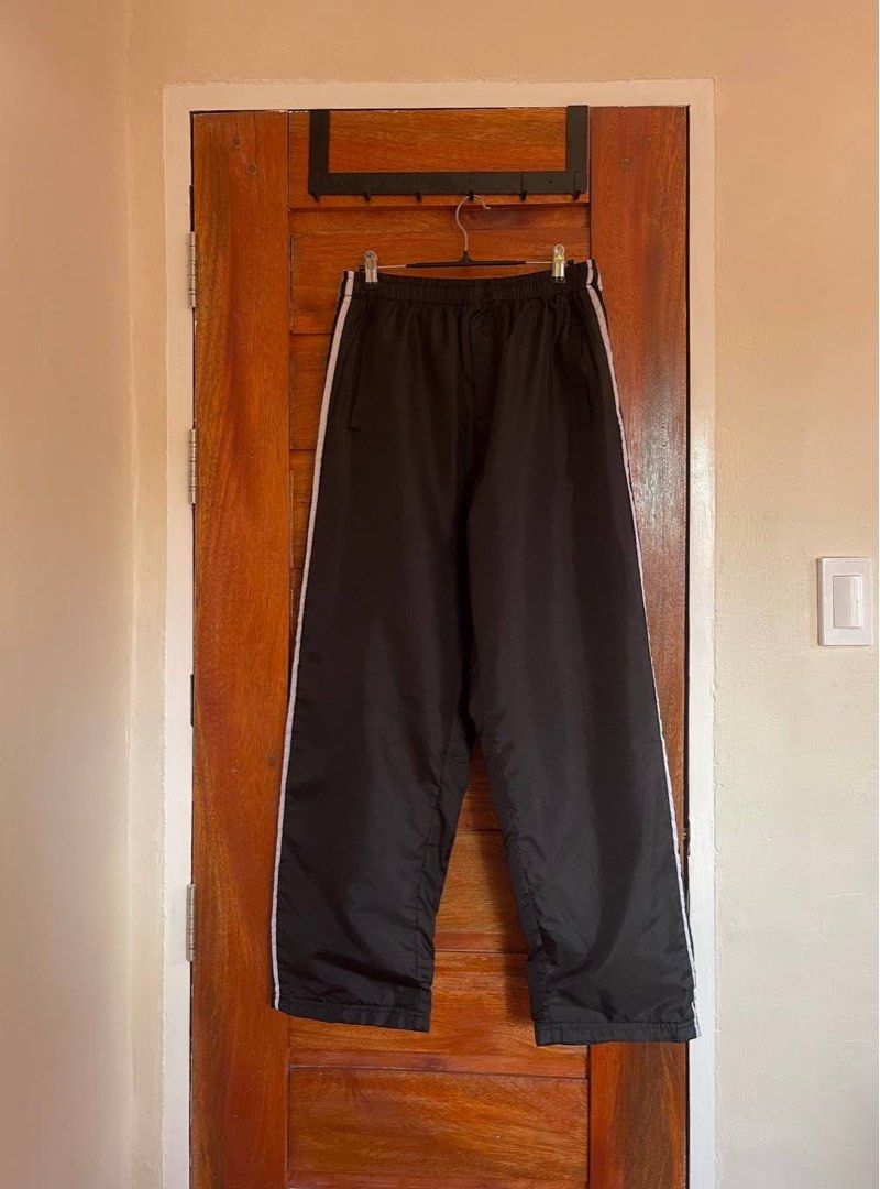 Two lines Track Pants (Category: Activewear) located in San Luis. Submitted by revibeee (Listing ID 1469804707, Image 1). Description: FOR SALE TWO LINES TRACK PANTS WITH DRAWSTRING AND SIDE POCKETS COLOR BLACK WITH WHITE LINES IN EXCELLENT CONDITION COLOR RATE 9/10 CAN FIT SIZE 25 TO 35 WAISTLINE LENGTH 40.5 INCHES UNISEX STRETCHABLE GARTERIZED WAIST WITH MINIMAL FLAWS KINDLY CHECK THE PHOTOS FOR THE COMPLETE DETAILS SUPER NICE IN ACTUAL THICK I