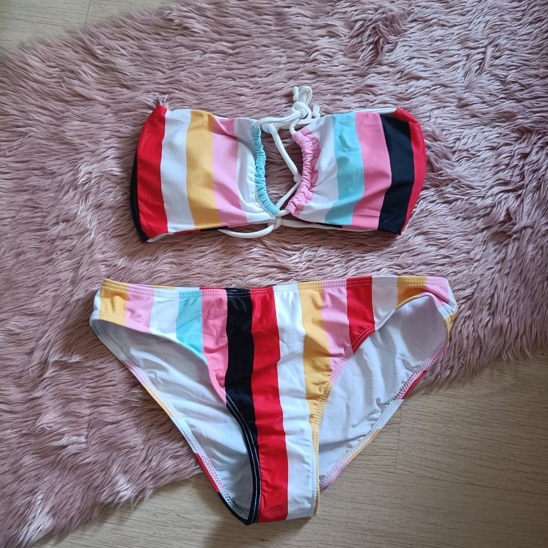 two piece self tie candy color set (Category: Bikinis & Swimsuits) located in Bacoor. Submitted by Miss_Chuch0521 (Listing ID 1469808723, Image 1). Description: Size: L-XL .