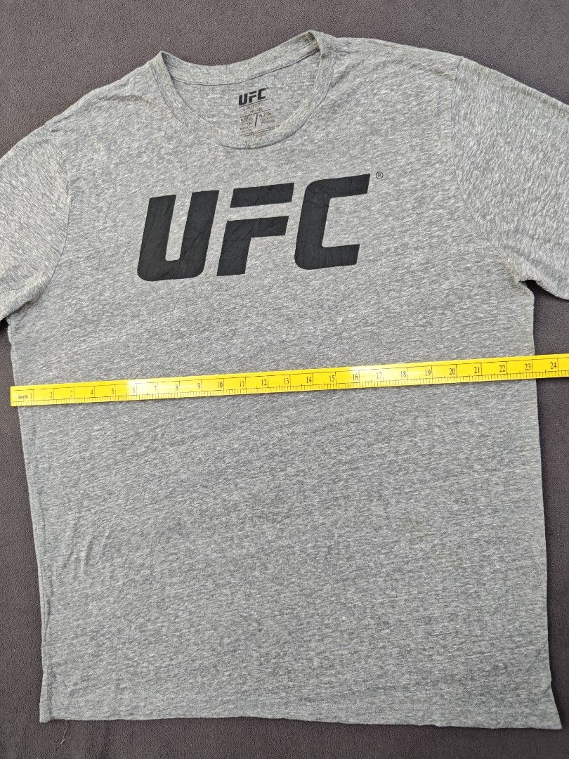 UFC Grey T-Shirt Size XL (Category: Tshirts & Polo Shirts ) located in Bulacan. Submitted by pzj_thrift (Listing ID 1469797691, Image 3). Description: condition 9/10 color rate 9/10 no issue.
