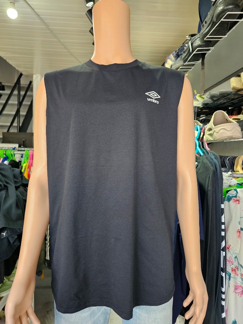 Umbro sleeveless athletic tank top (Category: Tshirts & Polo Shirts ) located in Baguio. Submitted by kayeonlineshop (Listing ID 1469819860, Image 1). Description: black Umbro sleeveless athletic tank top featuring the brand's double-diamond logo on the chest, similar to the Umbro Quick-Dry Muscle Fit Sleeveless T-shirt or performance base layer..