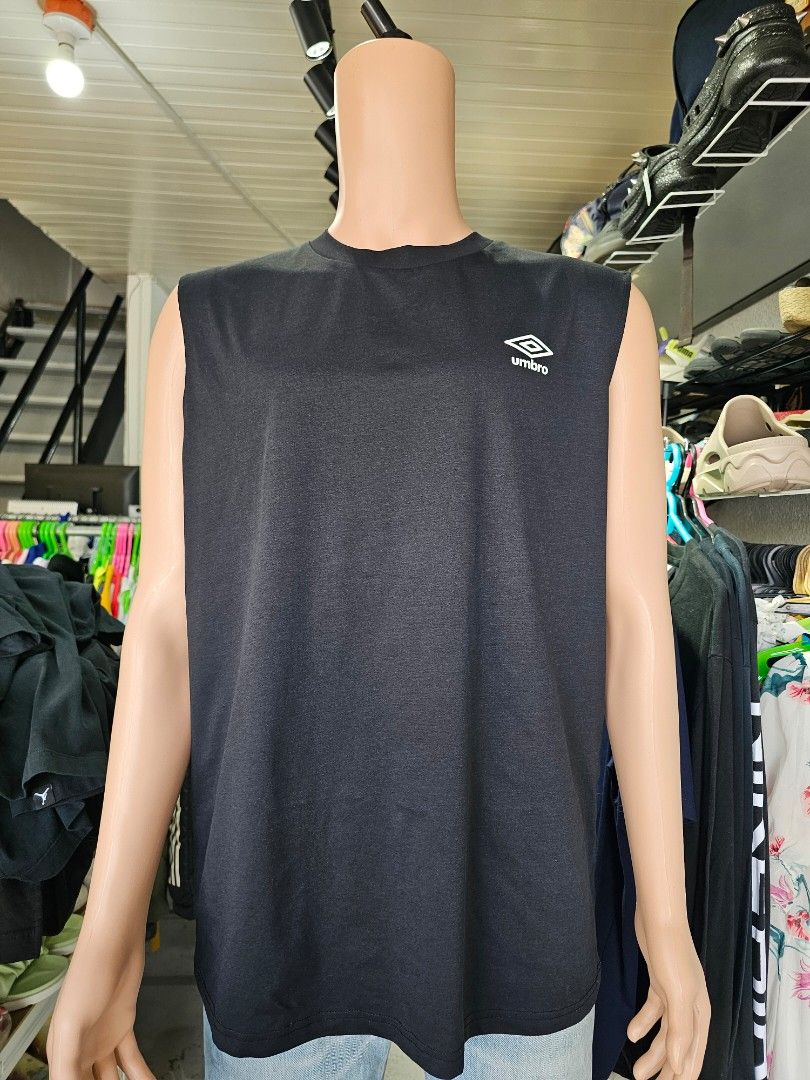 Umbro sleeveless athletic tank top (Category: Tshirts & Polo Shirts ) located in Baguio. Submitted by kayeonlineshop (Listing ID 1469819860, Image 2). Description: black Umbro sleeveless athletic tank top featuring the brand's double-diamond logo on the chest, similar to the Umbro Quick-Dry Muscle Fit Sleeveless T-shirt or performance base layer..