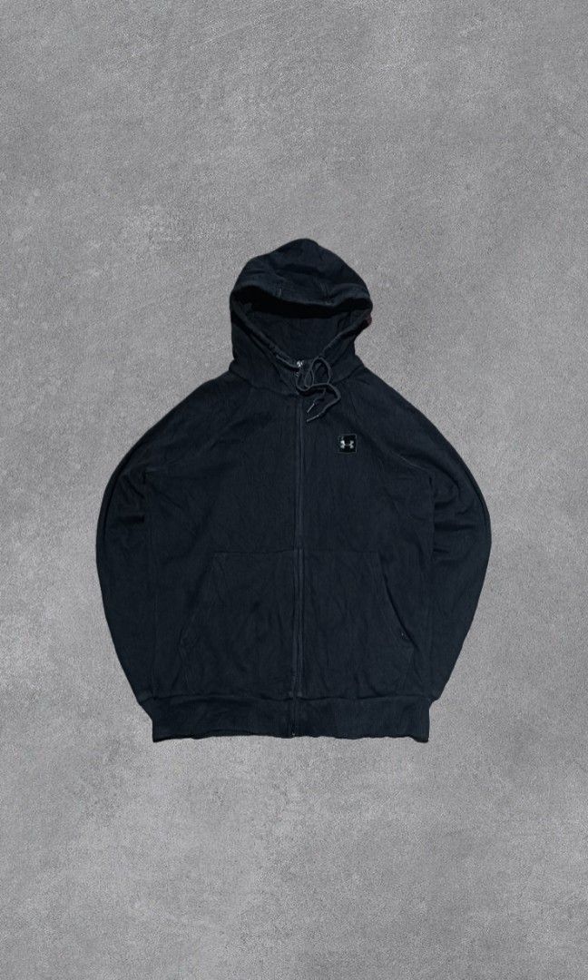 Under Armour Black Full-Zip Hoodie (Category: Coats, Jackets and Outerwear) located in Ozamiz City. Submitted by tby_thrfts (Listing ID 1469869422, Image 1). Description: Classic black Under Armour zip-up hoodie with a front kangaroo pocket and adjustable hood. Simple sporty look, perfect for casual outfits..