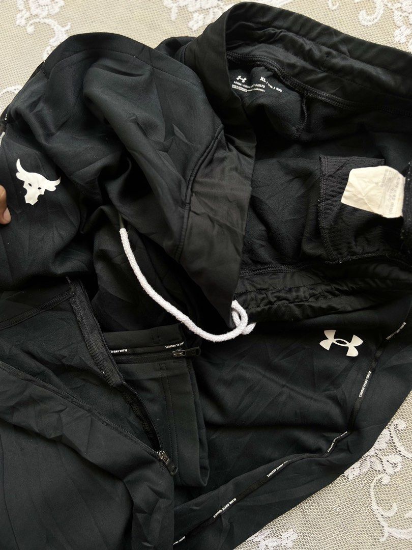 Under Armour Project Rock Black Track Pants XL (Category: Joggers) located in Manila. Submitted by trustedmichael. (Listing ID 1469801033, Image 2). Description: Under armour pants excellent W 36-40 L 42 Leg opening 8 with Zip both side Excellent - Brand: Under Armour Project Rock - Color: Black - Size: XL - Fit & Comfort: Elastic waistband with white drawstring, side pockets, and zip ankle cuffs - Design: Subtle abstract fabric pattern with Proj