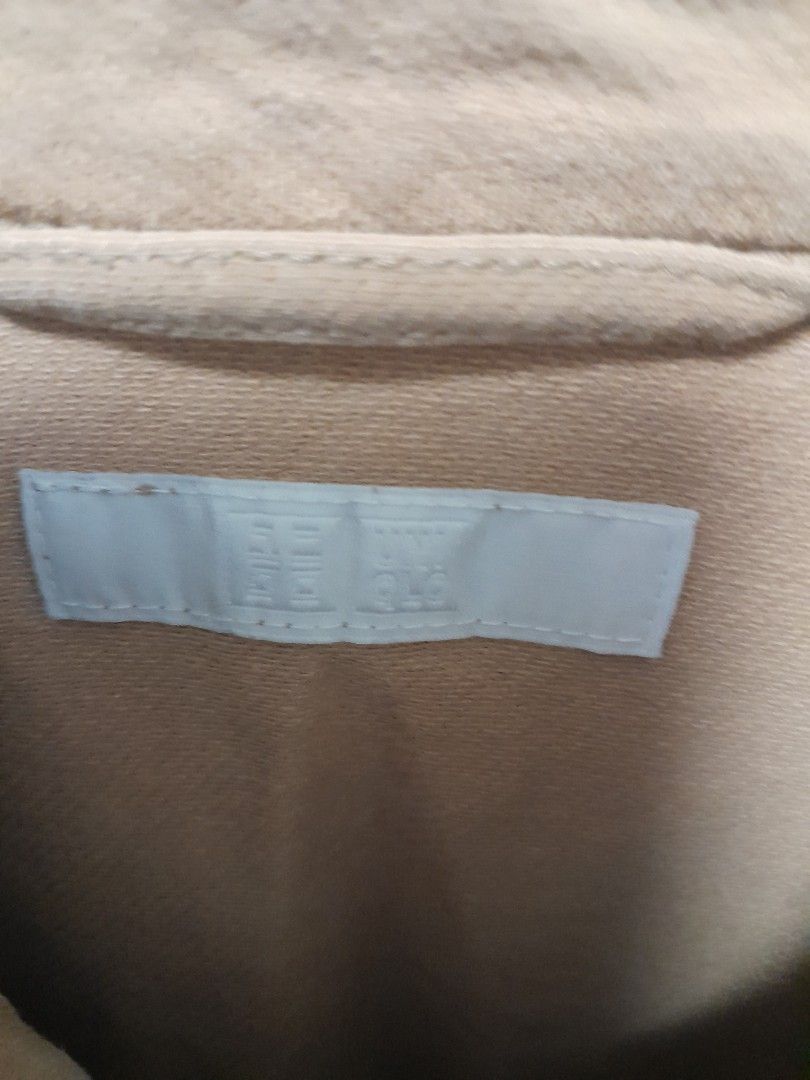 Uniqlo Beige Button-Up Jacket Size S (Category: Coats, Jackets and Outerwear) located in Manila. Submitted by glengpascu18784 (Listing ID 1469802285, Image 3). Description: - Brand: Uniqlo - Color: Classic Beige - Size: S - Closure: Front button-up with stylish brown buttons - Pockets: Multiple functional front patch pockets on chest and lower body - Details: Structured collar and long sleeves - Condition: Great everyday casual outerwear, easy to