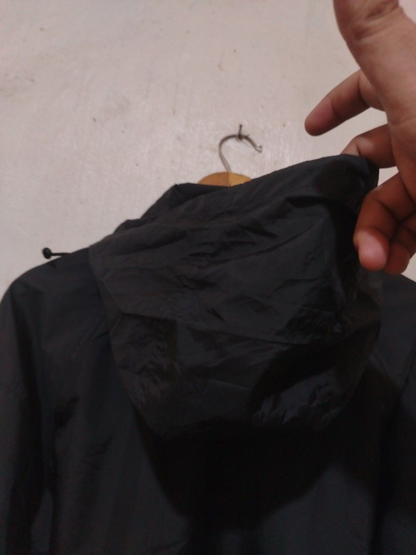 Uniqlo Black Windbreaker (Category: Coats, Jackets and Outerwear) located in Rizal. Submitted by gmpastoffi75031 (Listing ID 1469802256, Image 2). Description: - Brand: Uniqlo - dimes 24x28.5 - Color: Solid black - Size: Large (L) - Closure: Full zip up to the collar - Pockets: Convenient side pockets - Hood: Built-in hood included - Condition: Clean, excellent overall condition - Style: Versatile staple outerwear for casual daily wear or outdoor