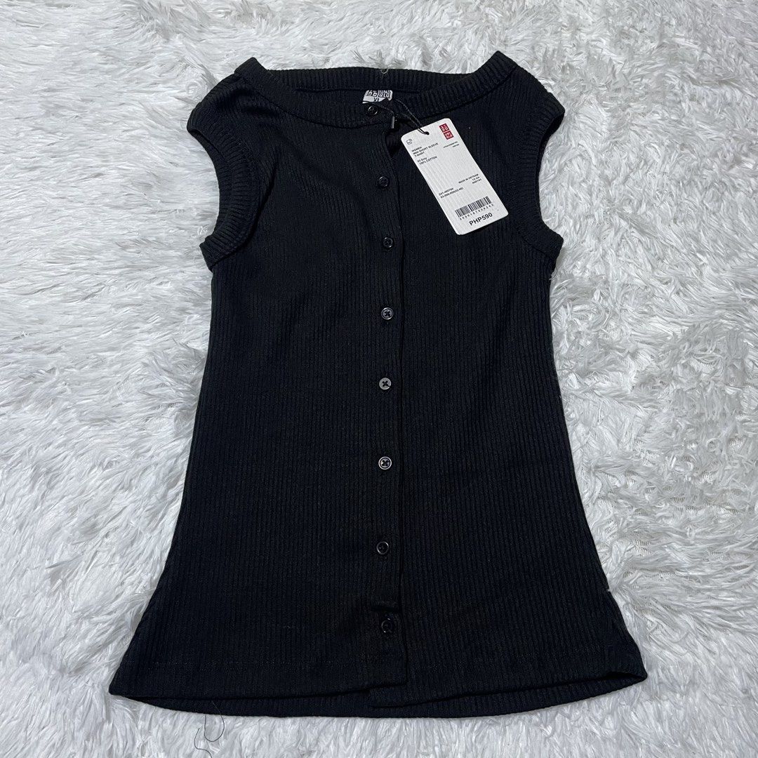 Uniqlo Black Ribbed Button-Up Sleeveless Top (Category: Sleeveless) located in Batangas. Submitted by strwsherry (Listing ID 1469858236, Image 1). Description: - Brand: Uniqlo - Condition: Brand new with tags attached - Color: Black - Style: Sleeveless top with round neckline and full button-up front - Material: Soft and stretchy ribbed fabric - Perfect for layering or wearing on its own.
