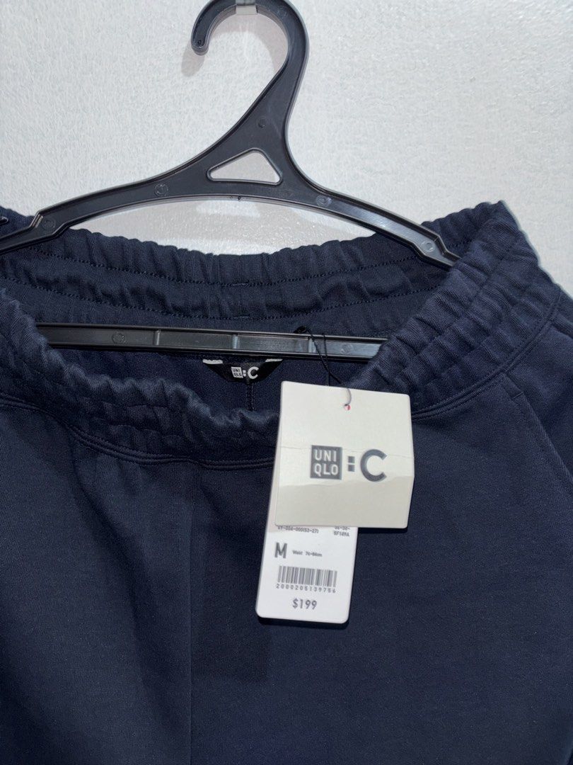 Uniqlo :C Sweatpants Navy Size M (Category: Joggers) located in Cuyapo. Submitted by mn.finds (Listing ID 1469787828, Image 2). Description: - Brand: Uniqlo:C Collection - Item: Sweatpants - Color: Dark Navy - Size: Medium (Waist 76-84cm) - Condition: Brand new with original store tags - Features: Elastic waistband with adjustable drawstring and side pockets.