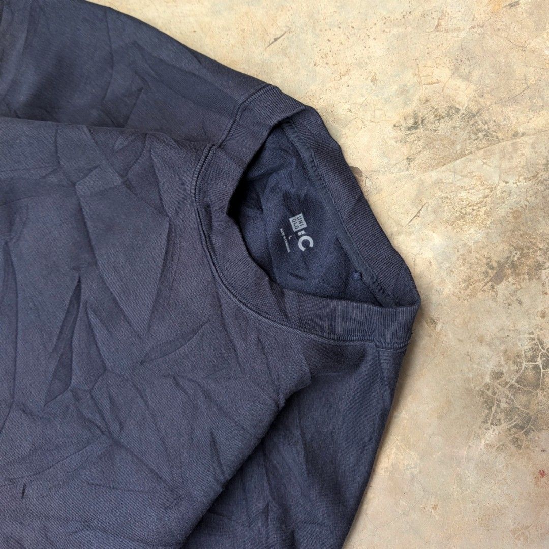 UNIQLO C sweatshirt (navyblue) (Category: Hoodies) located in Ozamiz City. Submitted by drithrft (Listing ID 1469893291, Image 3). Description: Un*ql* C sweatshirt Navy blue Dimensions (inches) Width - 23.5 Length - 26 Condition - 9/10 Issue - minor stain (last slide).