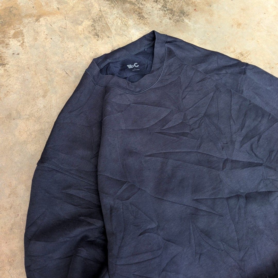 UNIQLO C sweatshirt (navyblue) (Category: Hoodies) located in Ozamiz City. Submitted by drithrft (Listing ID 1469893291, Image 2). Description: Un*ql* C sweatshirt Navy blue Dimensions (inches) Width - 23.5 Length - 26 Condition - 9/10 Issue - minor stain (last slide).