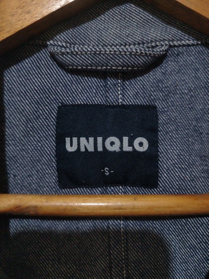 Uniqlo Denim Jacket (Category: Coats, Jackets and Outerwear) located in Rizal. Submitted by gmpastoffi75031 (Listing ID 1469817683, Image 3). Description: - Brand: Uniqlo - dimes 22x27.5 - Item: Denim Jacket - Color: Blue - Size: Small - Style: Classic workwear with structured fit and pointed collar - Closure: Front button-up - Pockets: Multiple utility pockets on chest and lower body - Details: Contrast stitching and clean interior size tag.