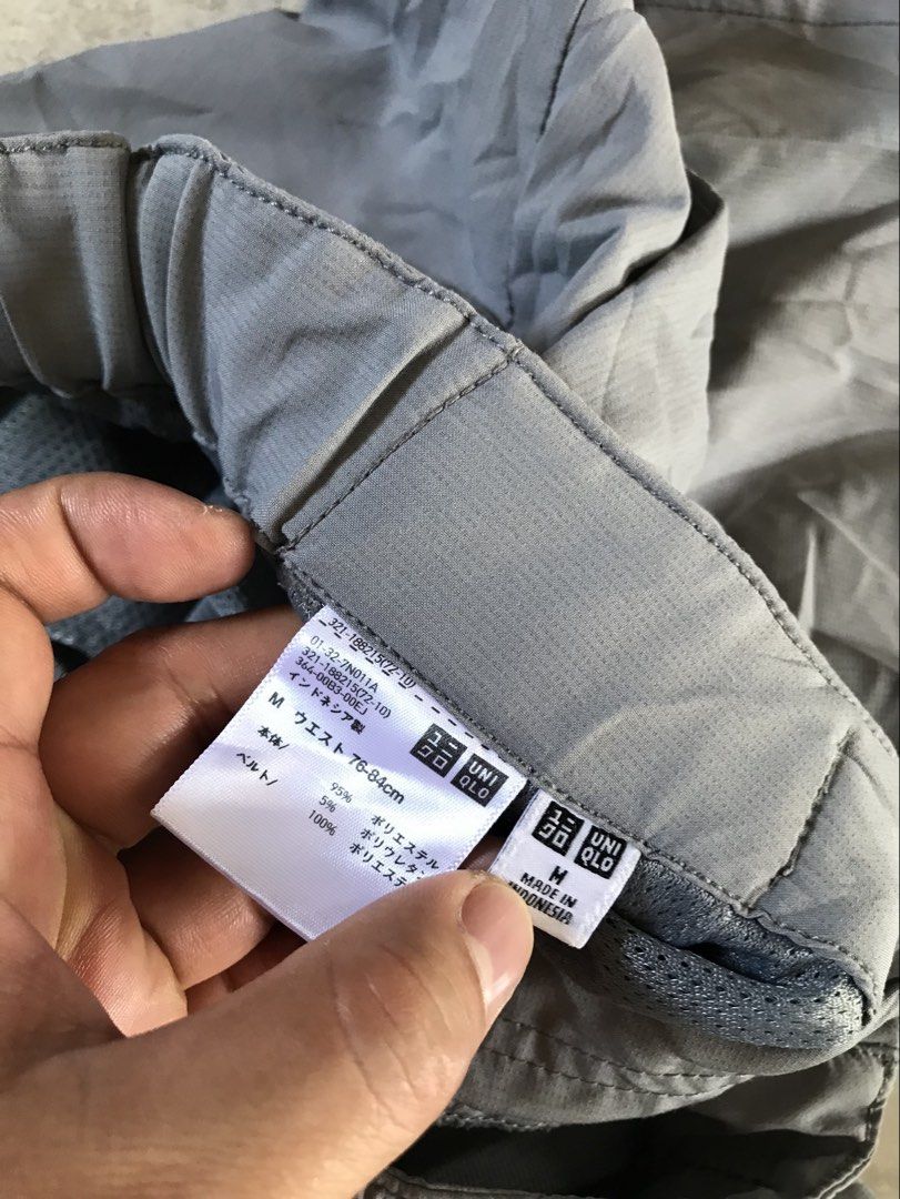 Uniqlo Grey Casual Pants Size M (Category: Trousers) located in Banga. Submitted by brighthorse.b8f582 (Listing ID 1469867565, Image 2). Description: - Brand: Uniqlo - Color: Grey - Size: M (Waist: 76-84cm) - Material: 95% Polyester, 5% Polyurethane (Lightweight and comfortable) - Features: Built-in black webbed belt with buckle, back elastic waistband, two side pockets - Origin: Made in Indonesia - Condition: Excellent, easy to adjust.