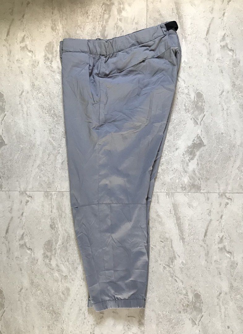 Uniqlo Grey Casual Pants Size M (Category: Trousers) located in Banga. Submitted by brighthorse.b8f582 (Listing ID 1469867565, Image 3). Description: - Brand: Uniqlo - Color: Grey - Size: M (Waist: 76-84cm) - Material: 95% Polyester, 5% Polyurethane (Lightweight and comfortable) - Features: Built-in black webbed belt with buckle, back elastic waistband, two side pockets - Origin: Made in Indonesia - Condition: Excellent, easy to adjust.