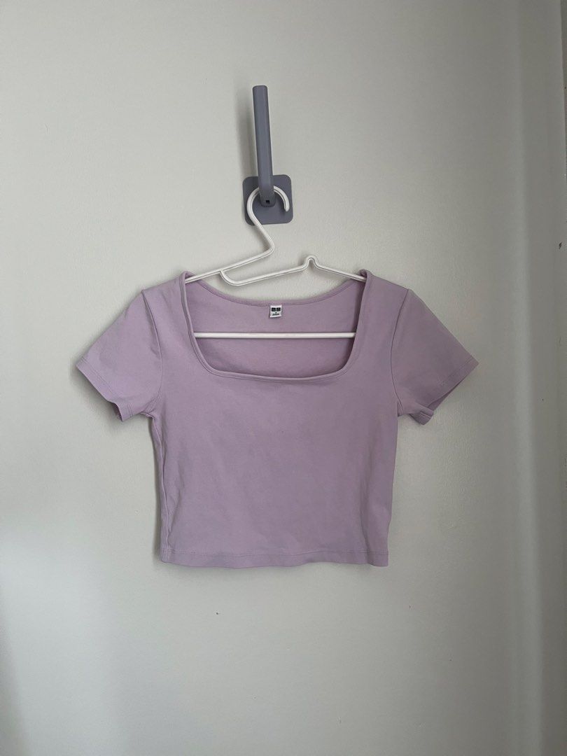 Uniqlo Lilac Top (Category: Sleeveless) located in Lapu Lapu. Submitted by alexisdeclutters (Listing ID 1469788079, Image 1). Description: - Brand: Uniqlo - Color: Pastel purple - Size: Small - Material: Ribbed cotton - Design: Square neckline with short sleeves - Condition: Great, clean inside and out - Style: Versatile basic piece, perfect for high-waisted jeans or skirts.