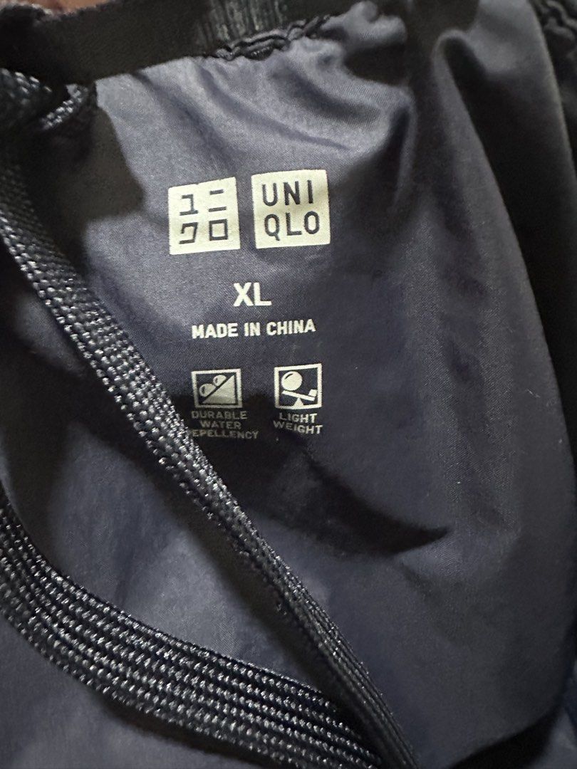 UNIQLO POCKETABLE PUFFER JACKET (Category: Coats, Jackets and Outerwear) located in Cainta. Submitted by shopbyroma (Listing ID 1469841355, Image 3). Description: Uniqlo Pocketable Puffer Jacket In good condition Color Navy Blue Size XL .