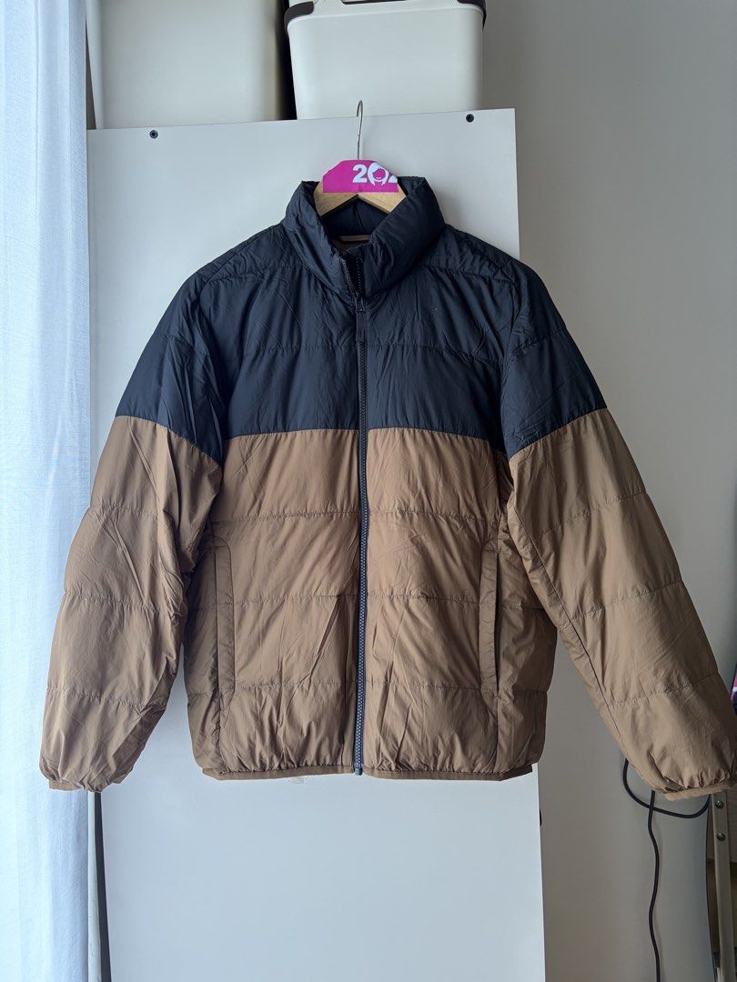 Uniqlo puffer jacket brown and black (Category: Coats, Jackets and Outerwear) located in Manila. Submitted by chiiisells_ (Listing ID 1469792805, Image 1). Description: .