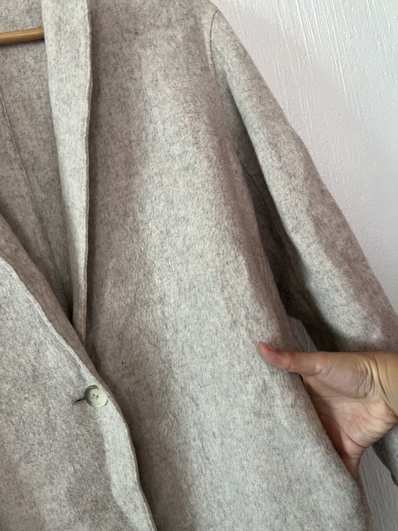 Uniqlo Wool Blend Trench Coat (Category: Coats, Jackets and Outerwear) located in Amadeo. Submitted by mavmadel (Listing ID 1469862531, Image 2). Description: -medium size on tag -lightweight -wool blended coat -condition 10/10 .