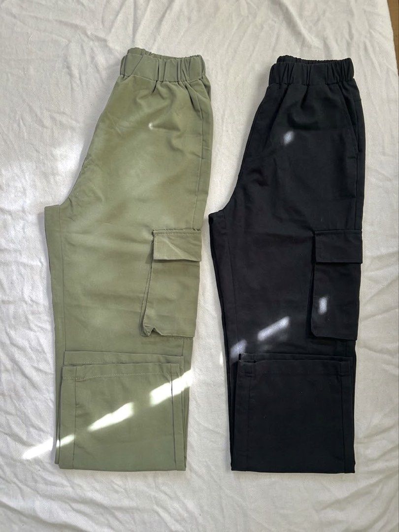 Unisex Cargo Pants Bundle (Green and Black) (Category: Other Bottoms) located in Lipa City. Submitted by collbyisidora (Listing ID 1469896337, Image 1). Description: - Set of 2 pairs: Olive Green and Black - Comfortable elastic waistband - Multiple utility pockets on the sides - Trendy straight leg cut.