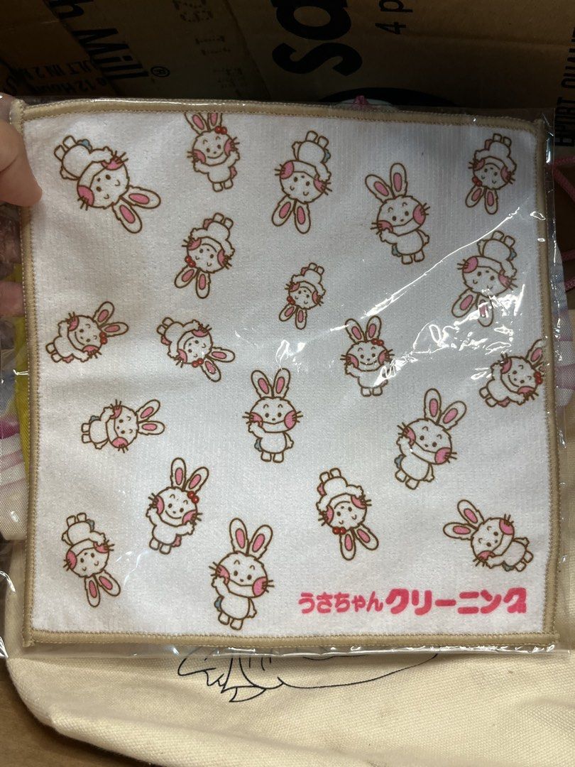 Usachan Cleaning Microfiber Towel Rabbit Print (Category: Bedding & Towels) located in Gapan. Submitted by lunashop14 (Listing ID 1469836009, Image 1). Description: - Item: Usachan Cleaning promotional microfiber towel - Design: Cute all-over rabbit pattern with brown border trim - Material: 100% polyester, standard square size - Condition: Brand new, still sealed in original plastic packaging with care label on back - Origin: Authentic Japanese 