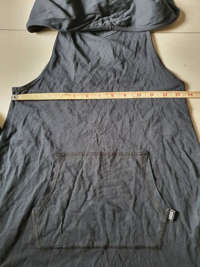 Vans Black Hooded Tank Top (Category: Sleeveless) located in Meycauayan. Submitted by shoptoown (Listing ID 1469786486, Image 2). Description: - Brand: Vans - Color: Black - Style: Hooded tank top with racerback straps and a casual sporty look - Features: Attached hood and front kangaroo pocket with a Vans tag - Material: Soft and comfortable cotton - Length: Approx. 31 inches total.
