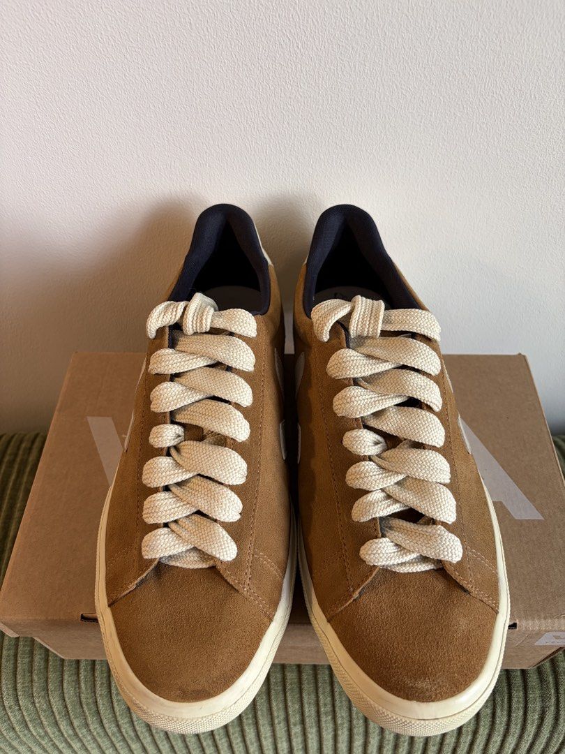 Veja Camel Pierre US M 11 (Category: Sneakers) located in Quezon City. Submitted by ronan1982 (Listing ID 1469938945, Image 3). Description: - Brand: Veja Campo - Material: Brown suede upper with off-white rubber soles - Colorway: Brown with cream laces and white V logo - Inclusions: Original box included - Condition: Uppers in great shape; soles show minor dirt from walking outside - Style: Versatile neutral sneakers, ideal for everyday outfits 