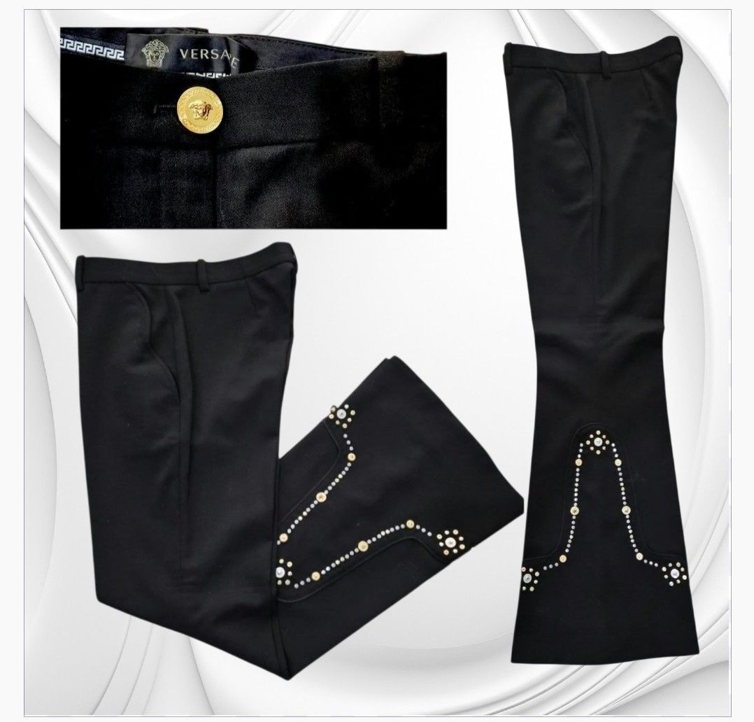 Versace Black Embellished Flare Trousers Size 38 (Category: Jeans) located in Paranaque City. Submitted by calm_youngstore7 (Listing ID 1469873621, Image 2). Description: 80% OFF RETAIL! DOUBLE YOUR MONEY BACK GUARANTEE ON AUTHENTICITY! Brand: Versace - Style: Black flare trousers with stud hardware along the lower legs - Size: 38 (Waist: 15 inches, Length: 37.5 inches) - Details: Iconic Medusa head buttons at the waistband and cuffs - Origin: Ma
