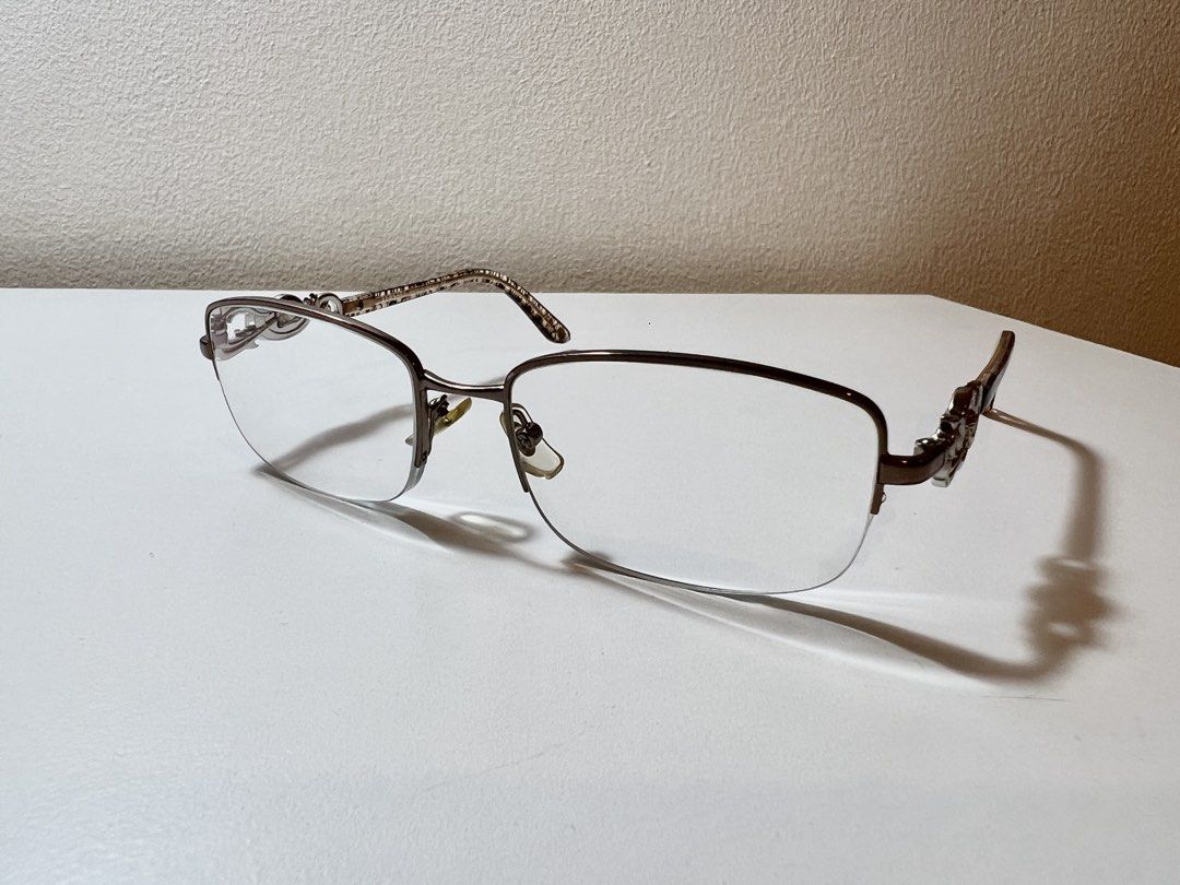 Versace Eyeglasses Frames (Category: Sunglasses & Eyewear) located in Mandaluyong City. Submitted by bbcage (Listing ID 1469878914, Image 3). Description: - Half-rim Versace frames - Color of the metal is a dark silvery gold - lenses have grade - perfect for if u want that office siren or bayonneta look but arent a fan of super small frames - model: Mod 1199 - rfs: bought on carousell also, but decided to use diff frames instead. i personally hav