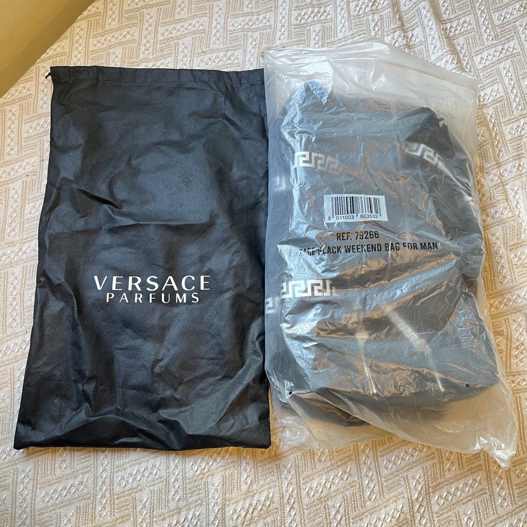 Versace Parfums Weekend Duffle Bag, Black Greca Print Straps, With Dust Bag (Category: Luxury Bags & Wallets) located in Quezon City. Submitted by francovvv (Listing ID 1469786321, Image 2). Description: - 12in (height) 20.5in (width).