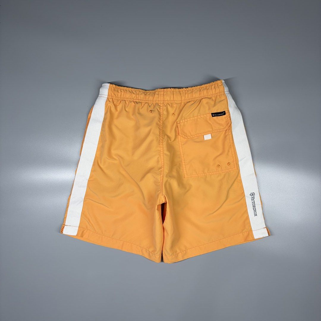 Victorinox Nylon Short With Inner Mesh (Category: Activewear) located in Cavite. Submitted by onebeancent (Listing ID 1469863652, Image 3). Description: Size: 30 to 34 Waistline Dimension: 17" Length Color: Orange Color Rate: 9.5/10 Issue: None Condition: Excellent Price: 680php Additional Shipping Fee (J&T Small Pouch) 75php Luzon 100php visayas 120php mindanao.
