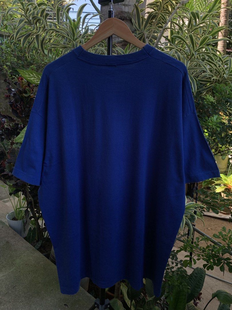 Vintage 1990s FOTL blank tee (Category: Tshirts & Polo Shirts ) located in Cagayan de Oro. Submitted by premium_thrifts (Listing ID 1469873433, Image 3). Description: Dark blue colorway. Good condition. Rare size Single stitch on both sleeves and hem Fits 2XL L32:5" x W27" 25" (shoulder to shoulder) 8.8" (sleeve length) Issue: has fades, and minimal lints Add shipping fee (via JRS or J&T).